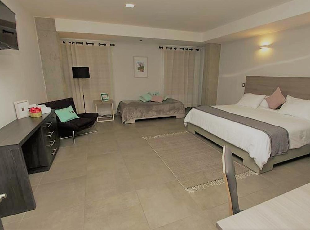 Maria Ines Hotel Suite San Agustin de las Juntas Exterior photo