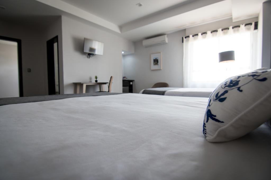 Maria Ines Hotel Suite San Agustin de las Juntas Exterior photo