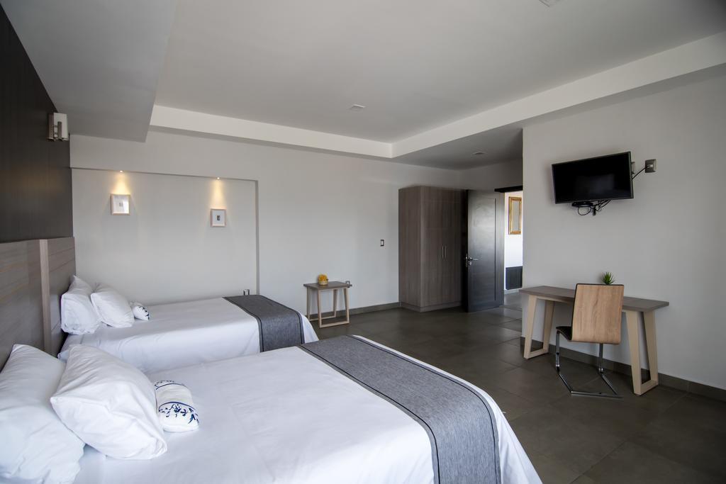 Maria Ines Hotel Suite San Agustin de las Juntas Exterior photo